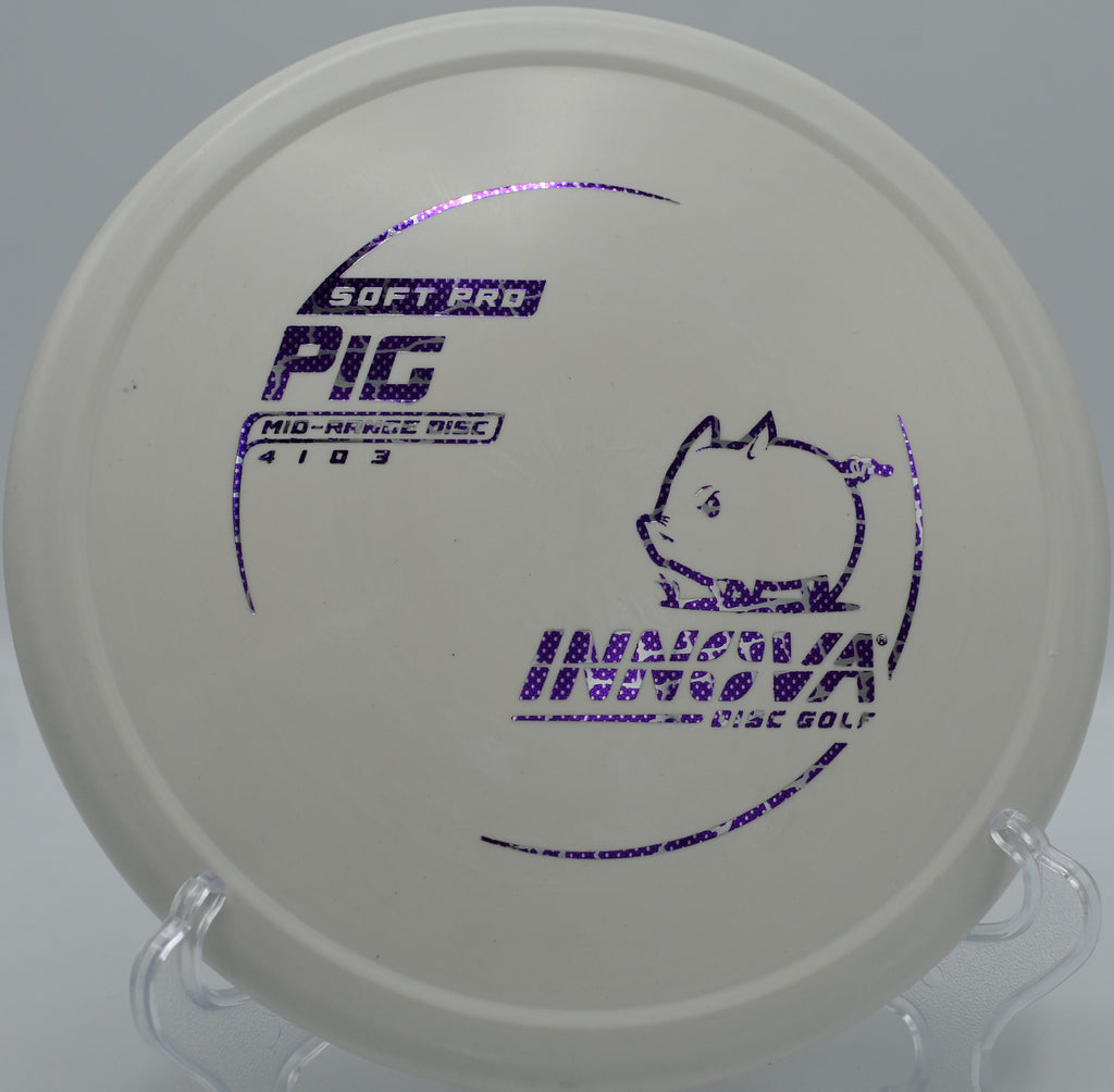 Close-up of Innova Soft Pro Pig grippy putter in flexible plastic at Veterans Park disc golf course in Arlington, Texas

