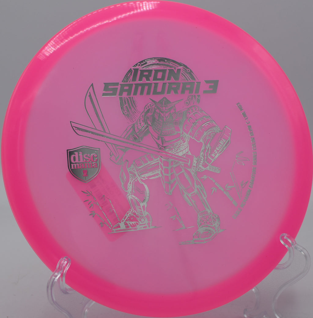 Discmania Iron Samurai 3 gliding through tight woods at Idlewild Disc Golf Course in Burlington, Kentucky.

