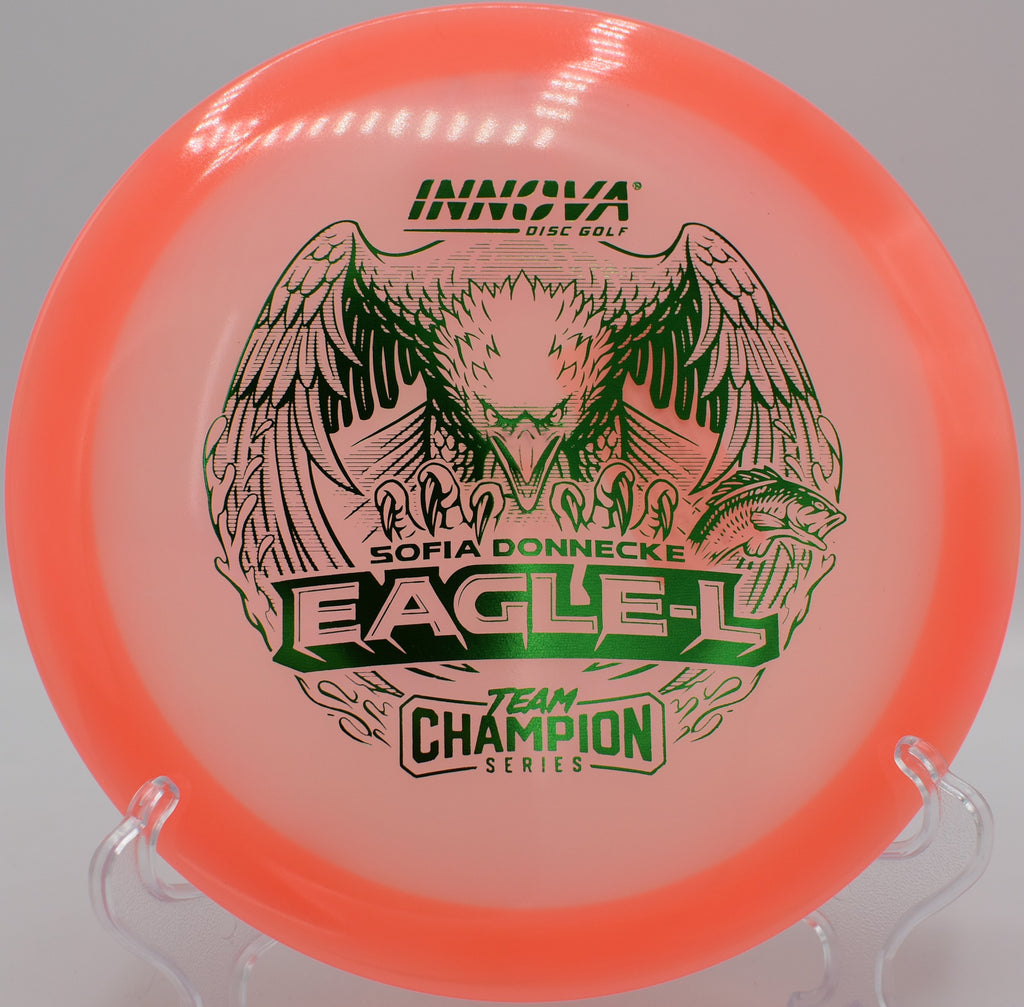 Glow-in-the-dark Proto Champion Eagle carving a hyzer line at Rocklin Disc Golf Course in California

