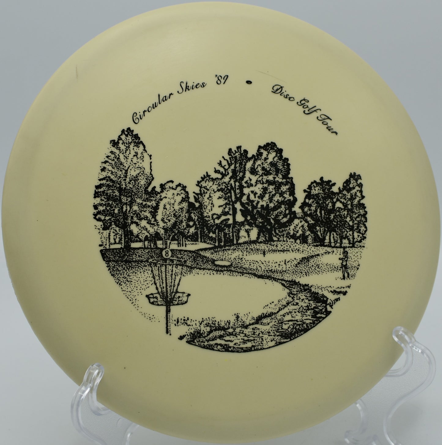 Innova Glow San Marino Roc gliding smoothly through a wooded gap on Hole 8 at Indian Hills Disc Golf Course, Bowling Green, Kentucky.