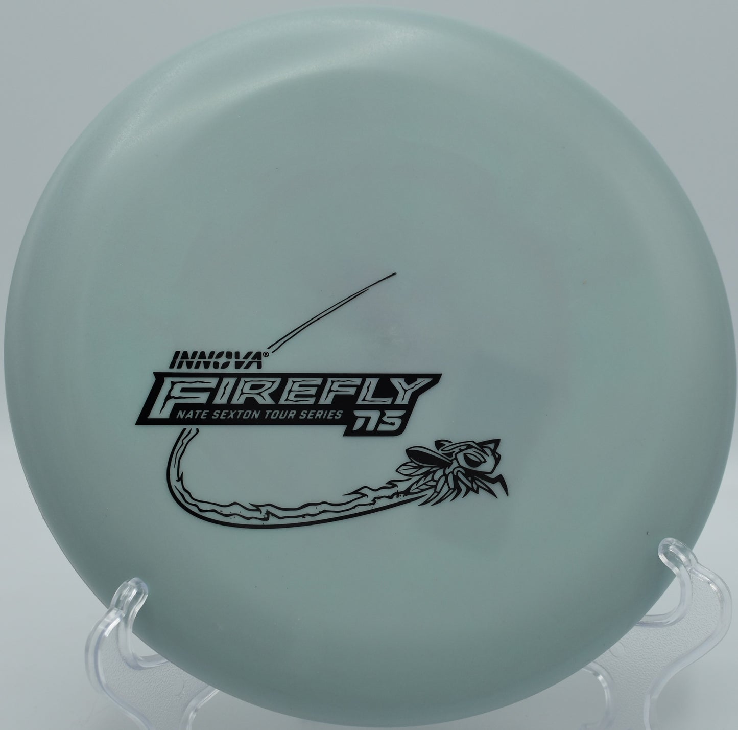Nexus Firefly beaded putter resting under basket in light wind at SeaTac Disc Golf Course in Washington


