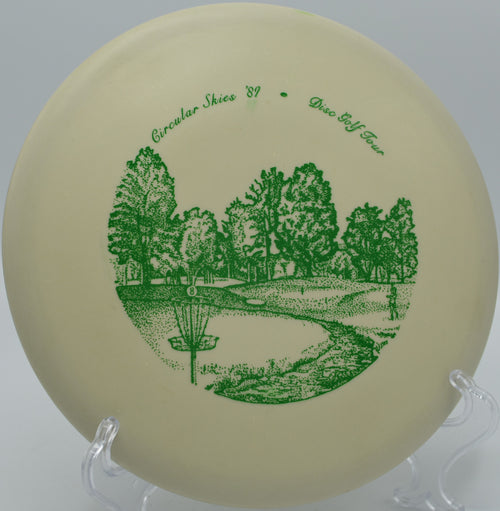 Innova DX Roc fading toward the basket on Hole 14 at Paw Paw Tunnel Disc Golf Course, Oldtown, Maryland.