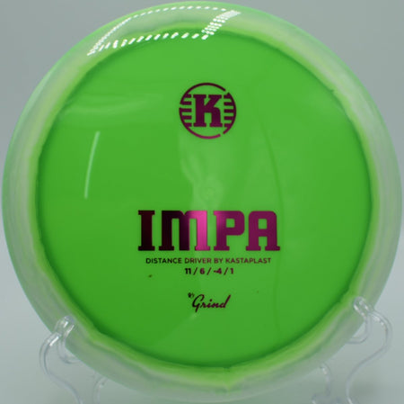 K1 Grind Impa disc golf distance driver carving a sweeping turnover at Idlewild Disc Golf Course, Burlington, Kentucky