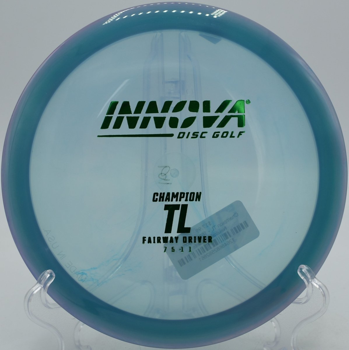 Innova Champion TL driver carving a smooth backhand line with glide at Murray Park Disc Golf Course in Little Rock, Arkansas