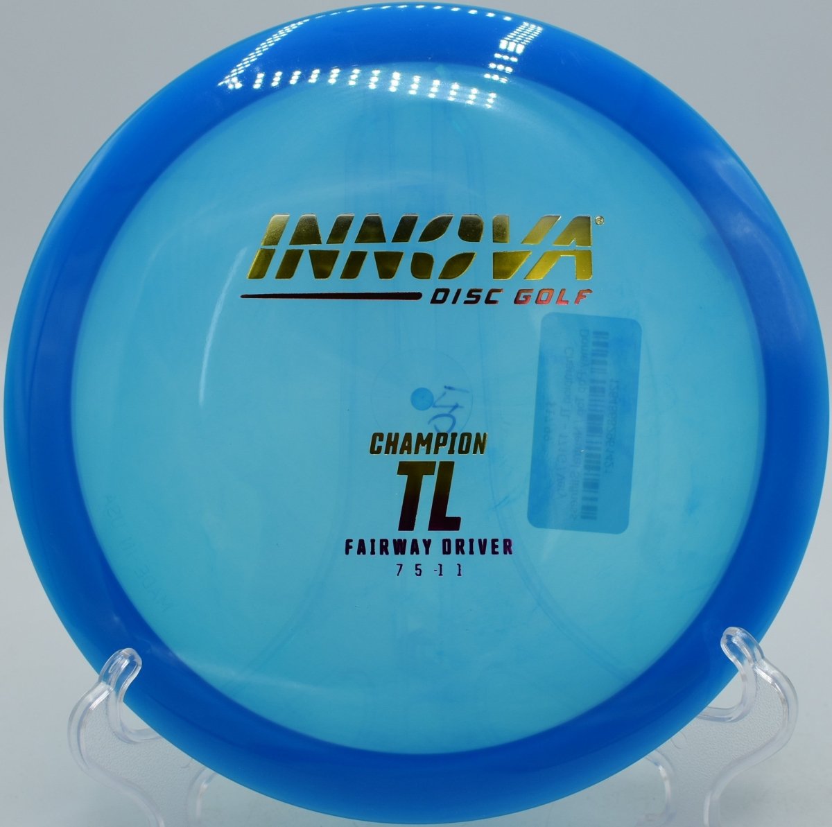 Innova Champion TL driver shaping a gentle anhyzer line into the green at Veterans Park Disc Golf Course in Arlington, Texas