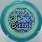 Proto Glow Halo Champion Gorgon bombing a max-distance drive on Hole 5 at Trophy Club Disc Golf Course, Trophy Club, Texas.