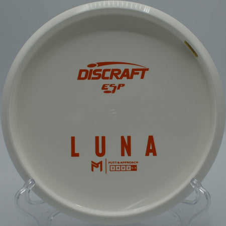 ESP Luna disc golf putter floating toward chains at Caliber Disc Golf Course, Sandpoint, Idaho