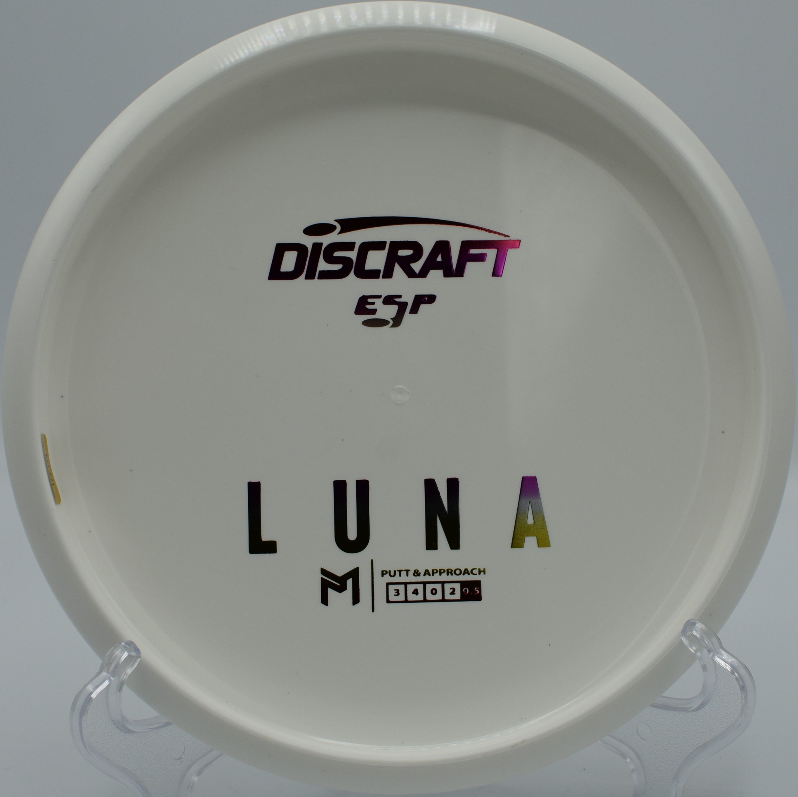 ESP Luna disc golf putter gliding through a wooded gap at Quaker Hill Disc Golf Course, Richmond, Indiana
