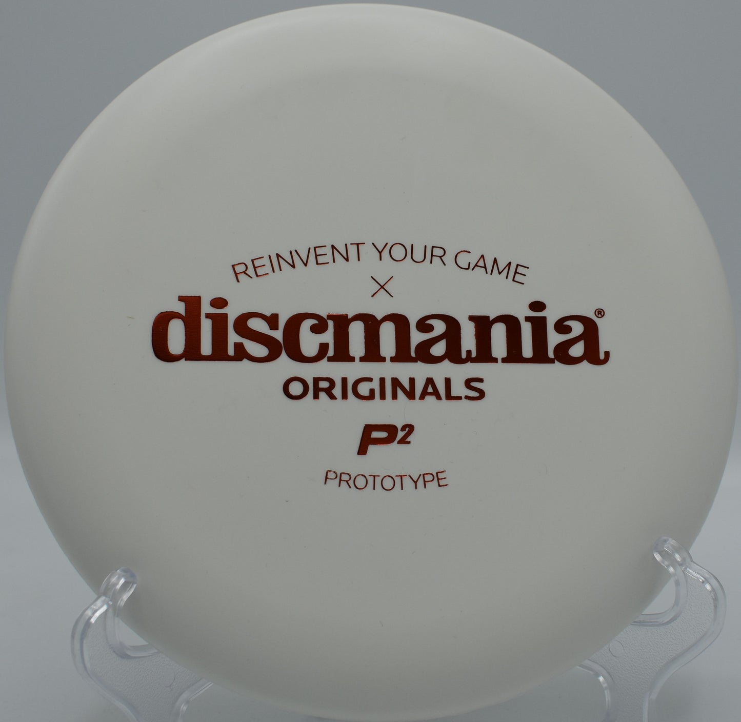Discmania P2 putter resting softly in the chains after a clean spin putt at Harmon Hills Disc Golf Course in Fall Branch, Tennessee


