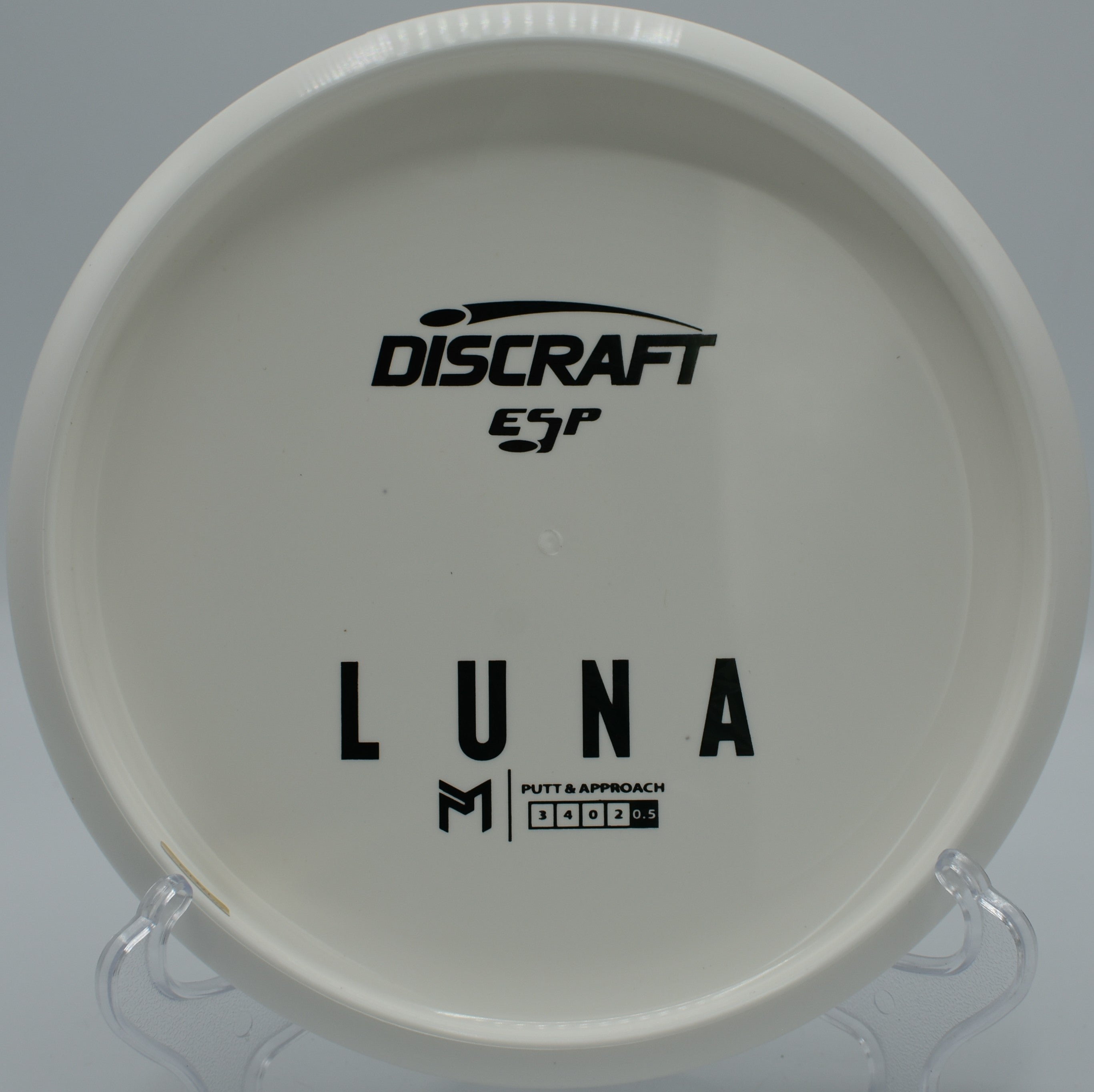 ESP Luna disc golf putter executing a controlled hyzer at Black Falls Disc Golf Course, Montgomery, Vermont