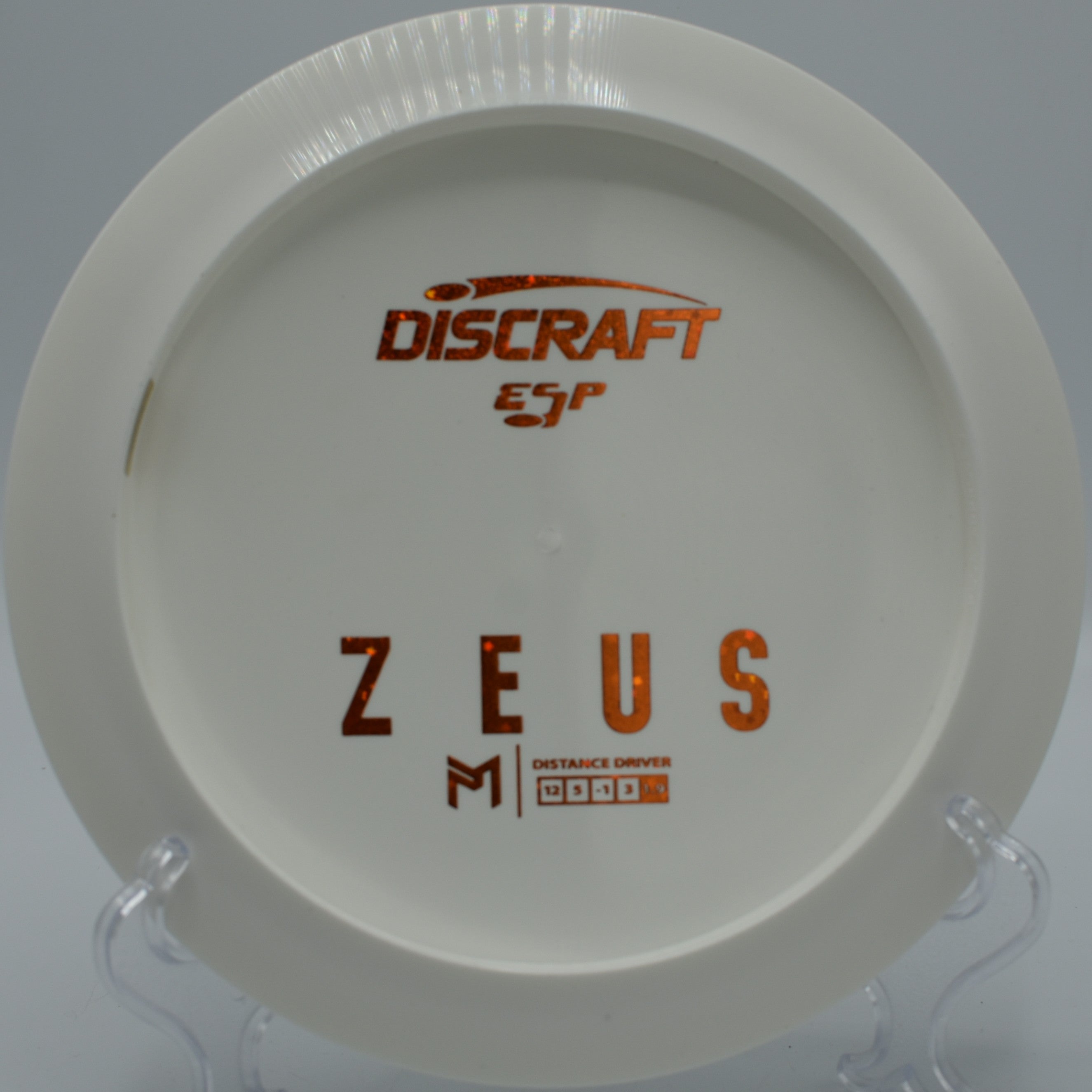 ESP Zeus disc golf distance driver launching a max-distance drive at Hidden Ridge Disc Golf Course, West Milford, New Jersey