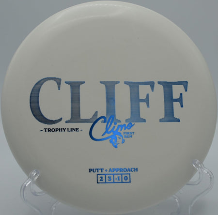 Trophy Line Cliff disc golf putter flying a dead-straight line at Shawnee Mission Park Disc Golf Course, Shawnee, Kansas