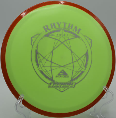 An Axiom Fission Rhythm parked near the basket after a perfect hyzer flip at Rosedale Park Disc Golf Course in Kansas City, Kansas.