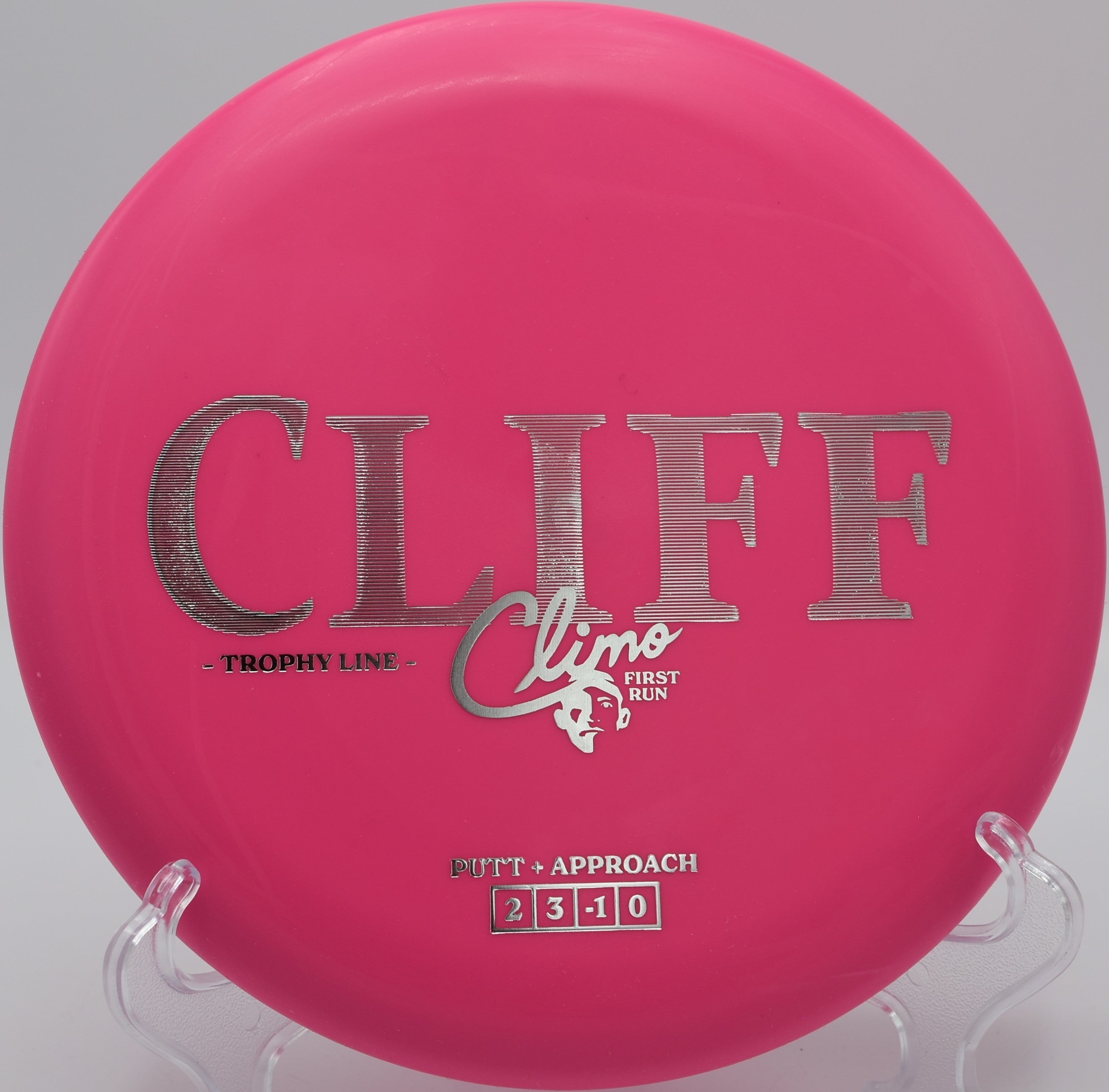 Trophy Line Cliff disc golf putter landing softly beside the basket at Buffalo Trace Disc Golf Course, Palmyra, Indiana