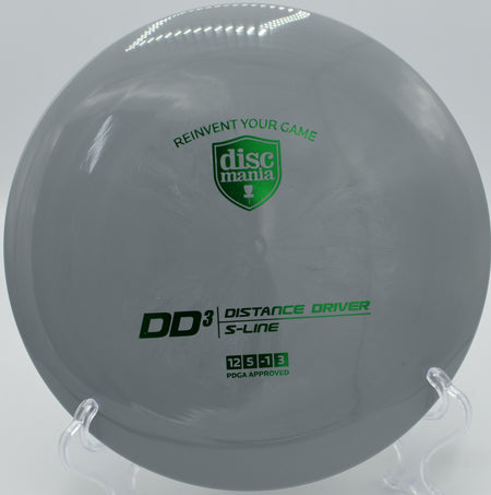 "S-Line DD3 disc, engineered for distance and control, on a tee pad at SeaTac Disc Golf Course, a popular location in Washington."
