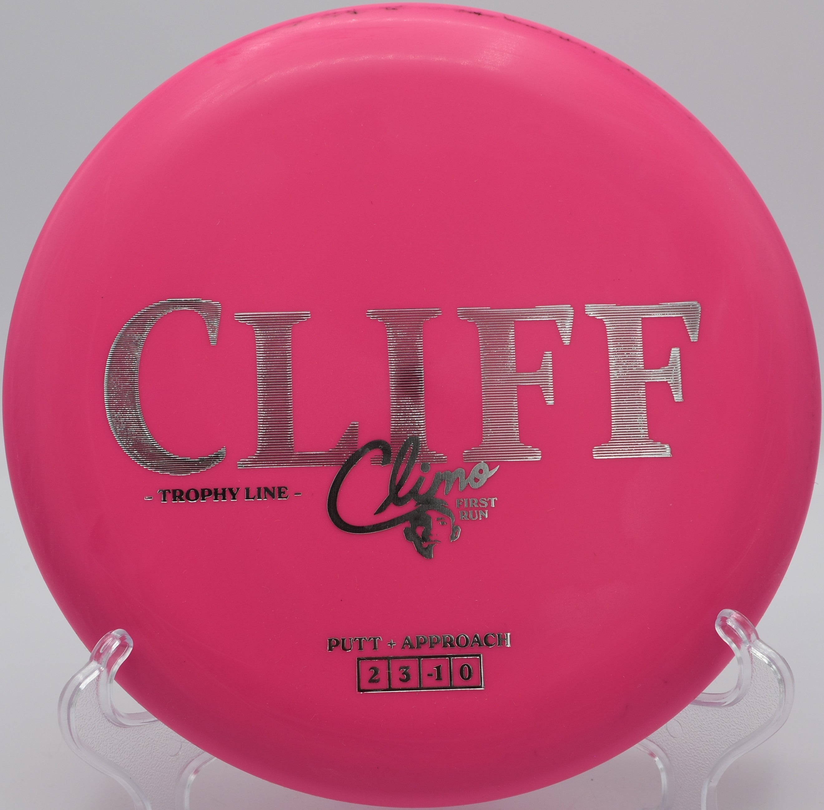 Trophy Line Cliff disc golf putter holding a straight putt at Sandy Point Disc Golf Ranch, Lac du Flambeau, Wisconsin