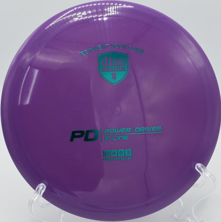 "S-Line PD disc golf driver with durable S-Line plastic, ready for a throw at Horning's Hideout Disc Golf Course in North Plains, OR."
