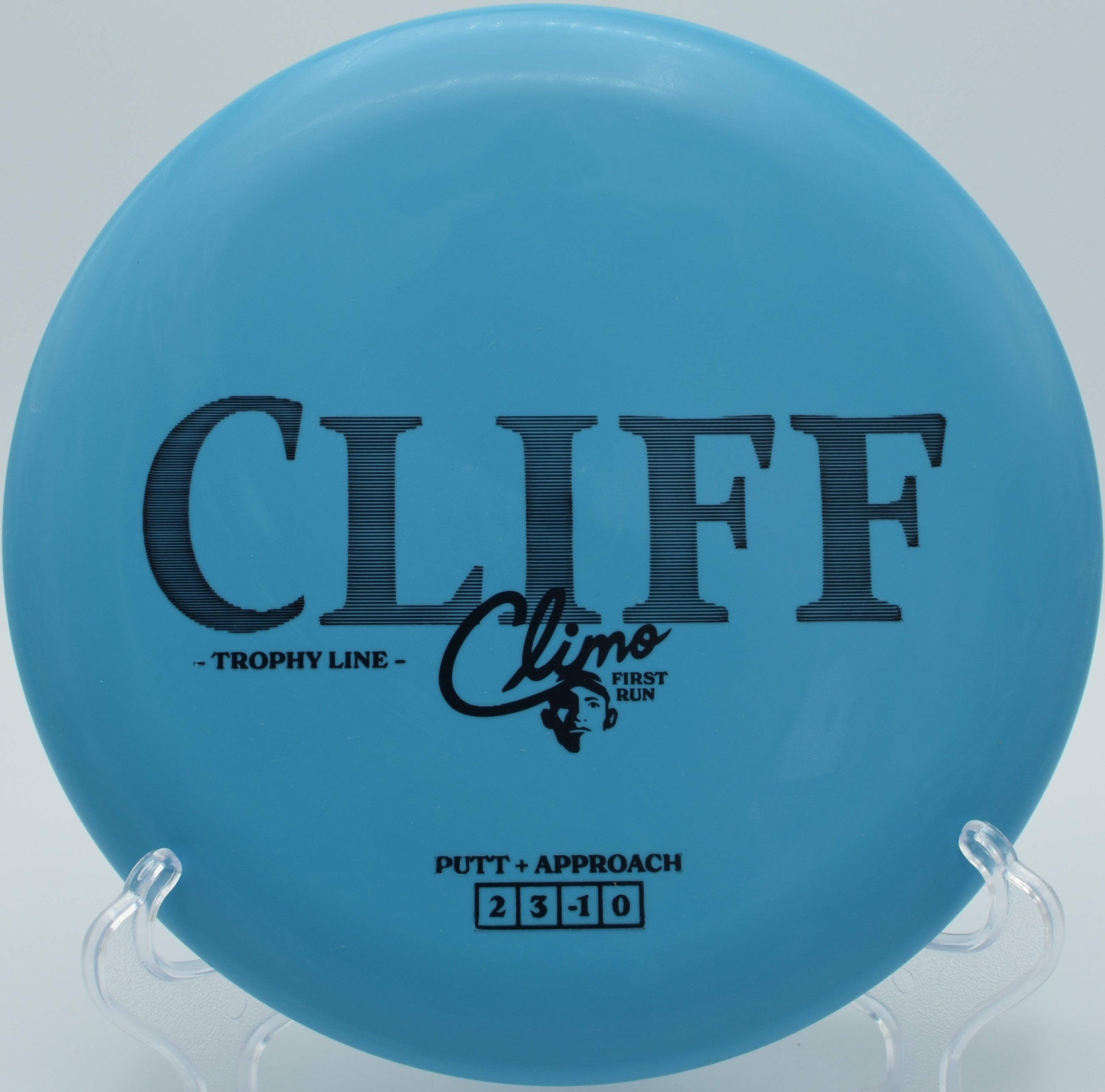 Trophy Line Cliff disc golf putter finishing beside the chains at The Claytons Disc Golf Course, Alcoa, Tennessee