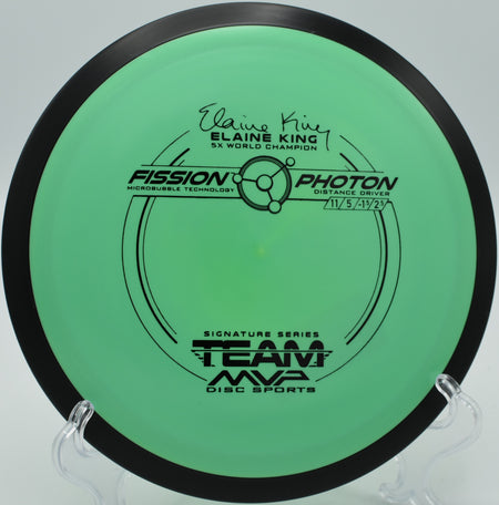 A player launching a Fission Photon for a controlled turnover drive at Fort Steilacoom Disc Golf Course in Lakewood, Washington.