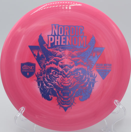 "Nordic Phenom S-Line PD disc golf fairway driver with a premium S-Line finish, photographed mid-flight at Maple Hill Disc Golf Course in Leicester, MA."
