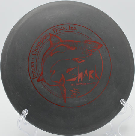 DX Shark – Stable midrange disc with a reliable fade, perfect for controlled shots at Blue Ribbon Pines Disc Golf Course in East Bethel, Minnesota.