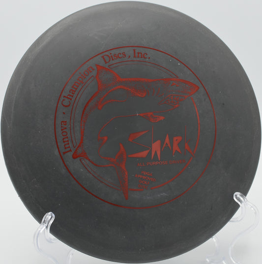 DX Shark – Stable midrange disc with a reliable fade, perfect for controlled shots at Blue Ribbon Pines Disc Golf Course in East Bethel, Minnesota.