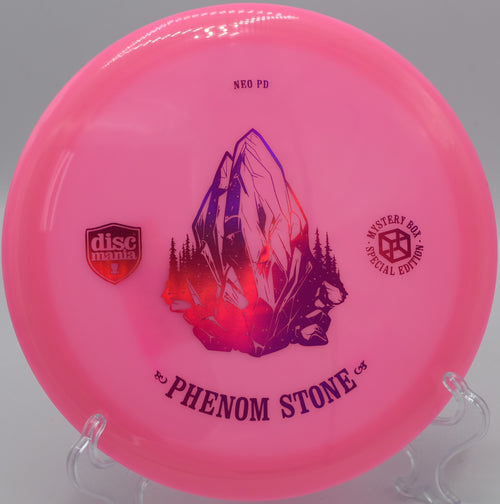 "Close-up of the Neo Essence The Phenom Stone disc, featuring premium Neo plastic, captured at DeLaveaga Disc Golf Course in Santa Cruz, CA."
