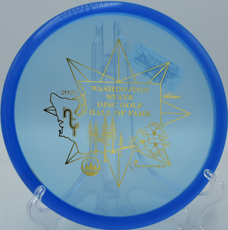 Discraft CryZtal FLX Zone sitting on the green after a controlled skip shot at Eagles Crossing in Hawk Point, Missouri.

