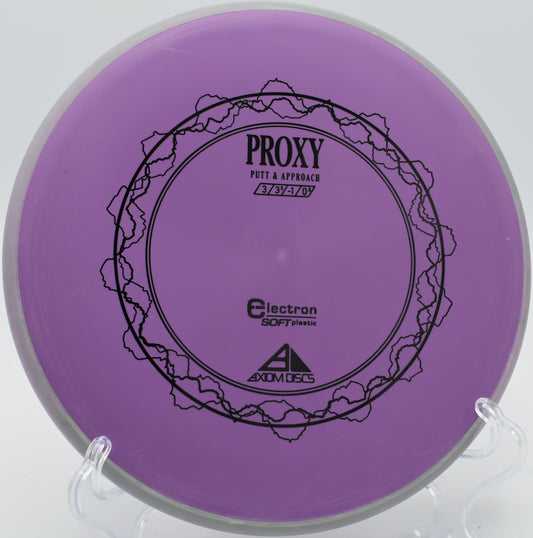 A disc golfer shaping a finesse approach shot with an Electron Proxy at Hornings Hideout Disc Golf Course in North Plains, Oregon.