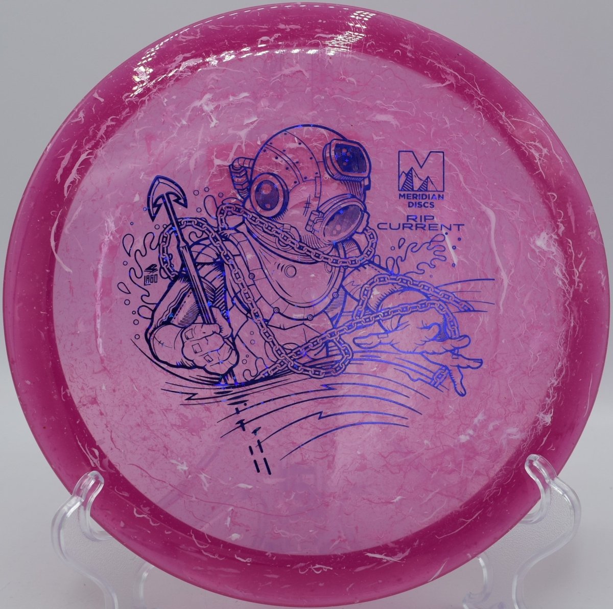 Marbled Clarus Rip Current driven flat at Lake Olmstead Disc Golf Course in Augusta, Georgia, finishing with clean fade
