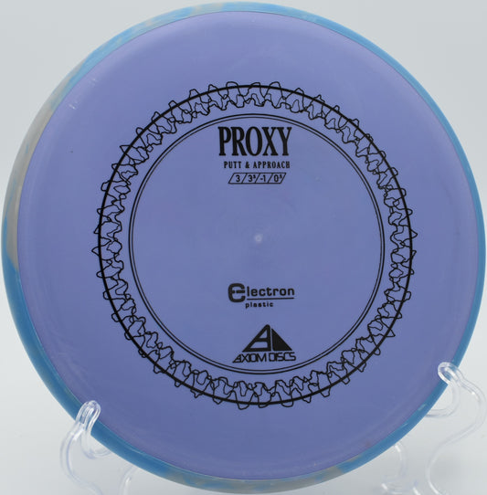 A disc golfer using an Electron Proxy for a soft hyzer approach at Rollin Ridge Disc Golf Course in Reedsville, Wisconsin.
