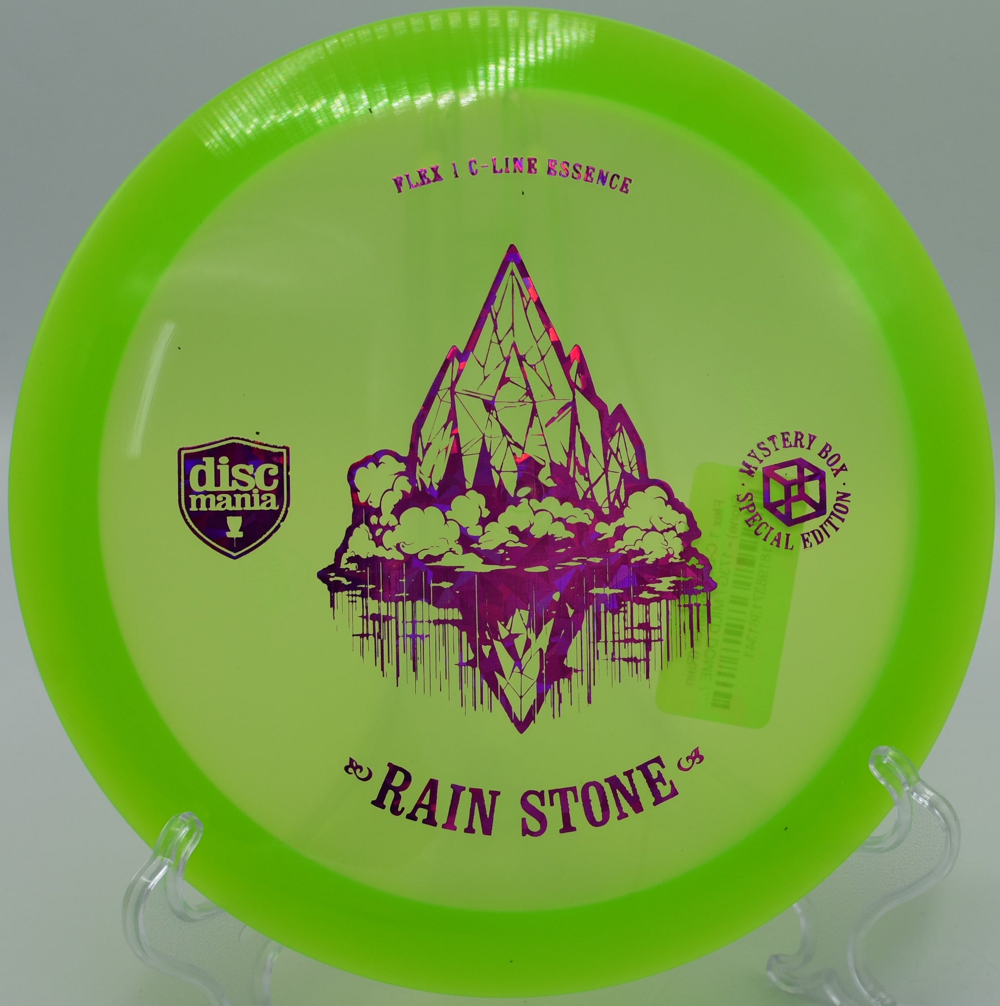 "Rain Stone Essence disc gliding through wooded fairways at Idlewild Disc Golf Course in Burlington, Kentucky."
