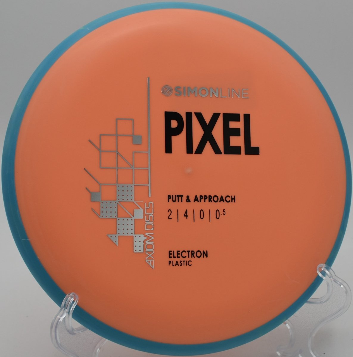 MVP Electron Soft Pixel putter staged for a spin putt on the green at Lake Olmstead Disc Golf Course in Augusta, Georgia
