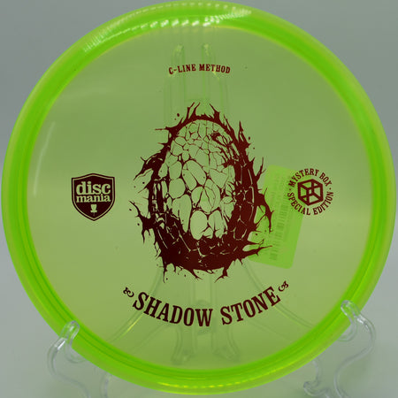 "Shadow Stone midrange disc in motion, perfect for controlled approaches, at Idlewild Disc Golf Course in Burlington, Kentucky."
