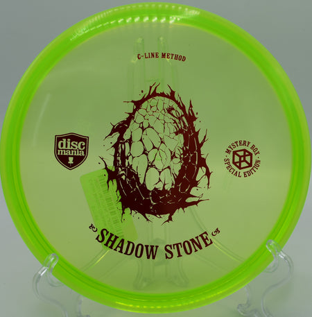 "Shadow Stone midrange disc gliding over open terrain at Harmony Bends Disc Golf Course in Columbia, Missouri, showcasing its glide."
