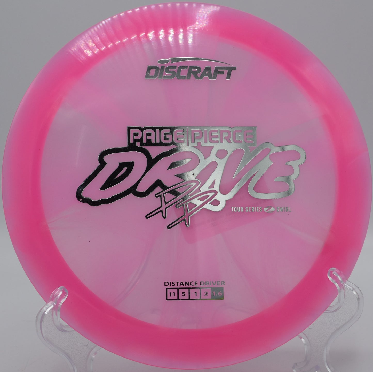 Discraft Drive with pastel Jawbreaker Z-FLX swirls flying straight at Northwood Black in Illinois


