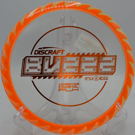 CryZtal Clear Flx FuZed Buzzz midrange flying straight at Maple Hill Disc Golf Course in Leicester, Massachusetts