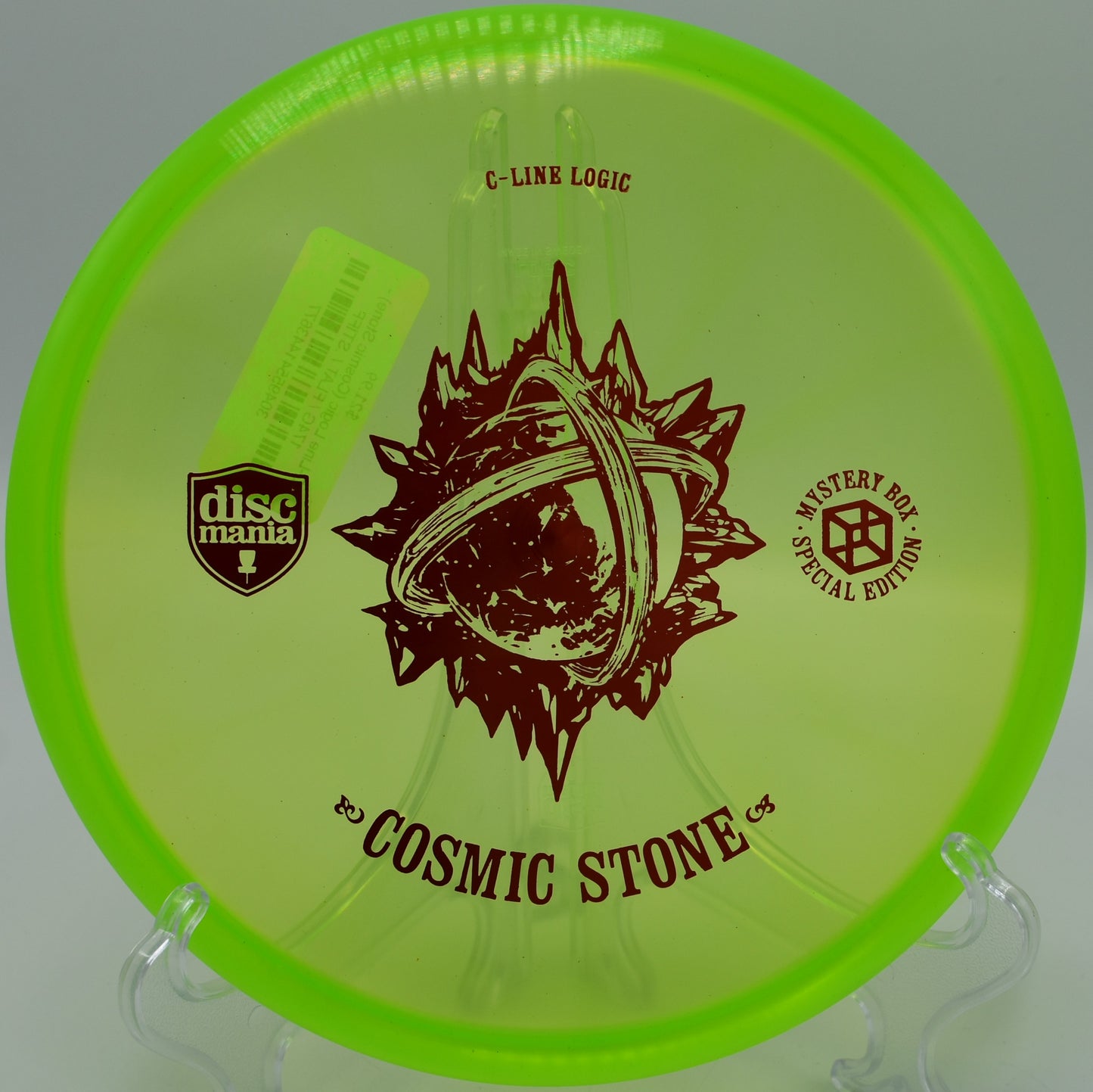 "Cosmic Stone putter disc captured mid-putt at Toboggan Disc Golf Course in Milford, Michigan, demonstrating its reliability under pressure."
