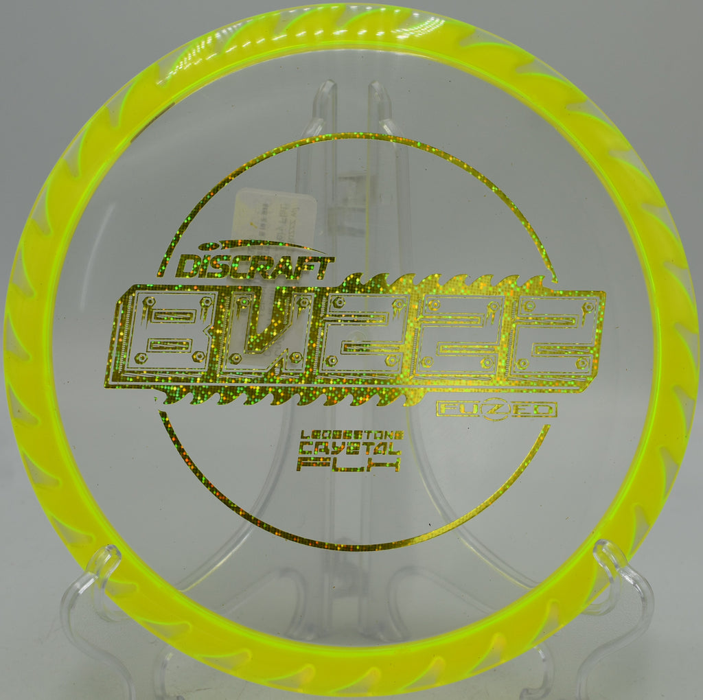 FuZed Buzzz with clear CryZtal center on a straight fairway drive at Harmon Hills Disc Golf Course in Fall Branch, Tennessee