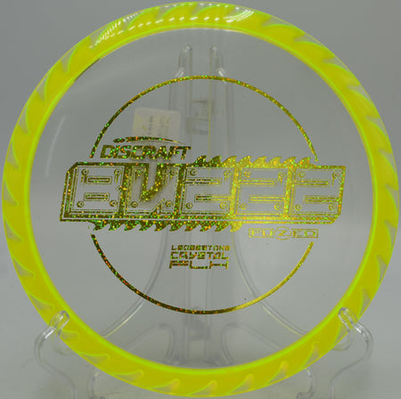 FuZed Buzzz with clear CryZtal center on a straight fairway drive at Harmon Hills Disc Golf Course in Fall Branch, Tennessee