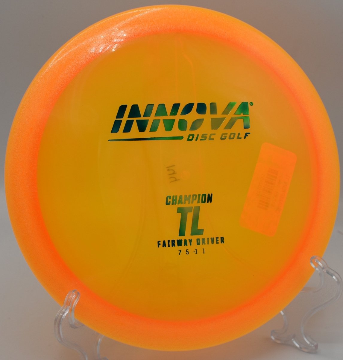 Innova Champion TL fairway driver carving a straight control line through wooded fairway at Cedarock Park Wellspring Course in Burlington, North Carolina