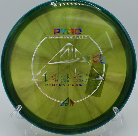 A player preparing to throw the Prism Proton Pyro on the fairway at Winthrop University Disc Golf Course in Rock Hill, South Carolina, demonstrating its excellent grip and stability.