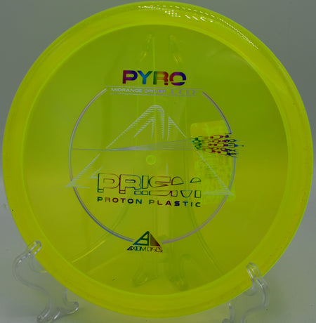 Action shot of the Prism Proton Pyro mid-flight, captured on the fairway at Sunset Park Disc Golf Course in Las Vegas, Nevada, showcasing its controlled fade and consistent flight.