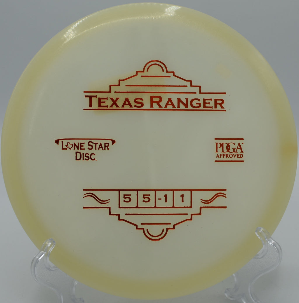 "Lone Star Glow Texas Ranger disc captured mid-flight against the skyline of Denver, Colorado, ready for precise, long-distance shots."
