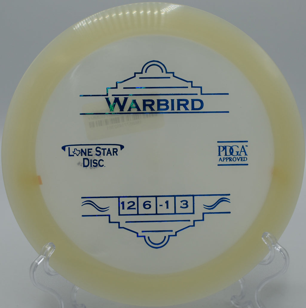 "Glow Warbird disc gliding down the fairway in Nashville, Tennessee, engineered for distance and accurate placement."
