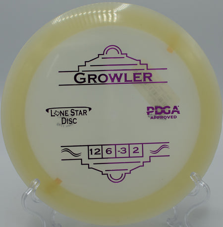 "Close-up of the Glow Growler disc spinning effortlessly off the tee in Salt Lake City, Utah, showcasing its precision and control."
