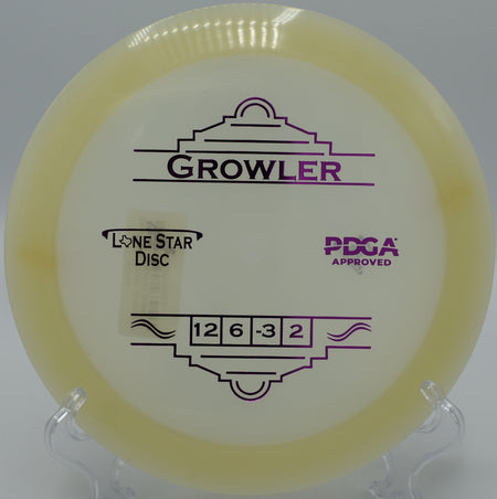 "Glow Growler disc gliding through the air under the evening sky in Las Vegas, Nevada, perfect for night rounds and controlled throws."
