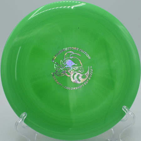 Colorshift ESP Buzzz shimmering in flight at Fountain Hills Disc Golf Park in Fountain Hills, Arizona