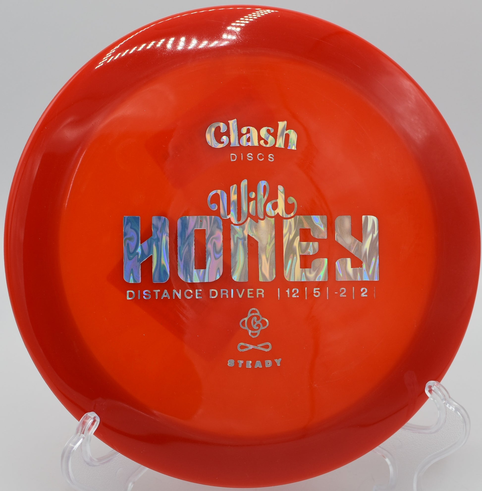 "Wild Honey disc soaring through wooded fairways in Atlanta, Georgia, crafted for players looking for a balance of turn and stability."
