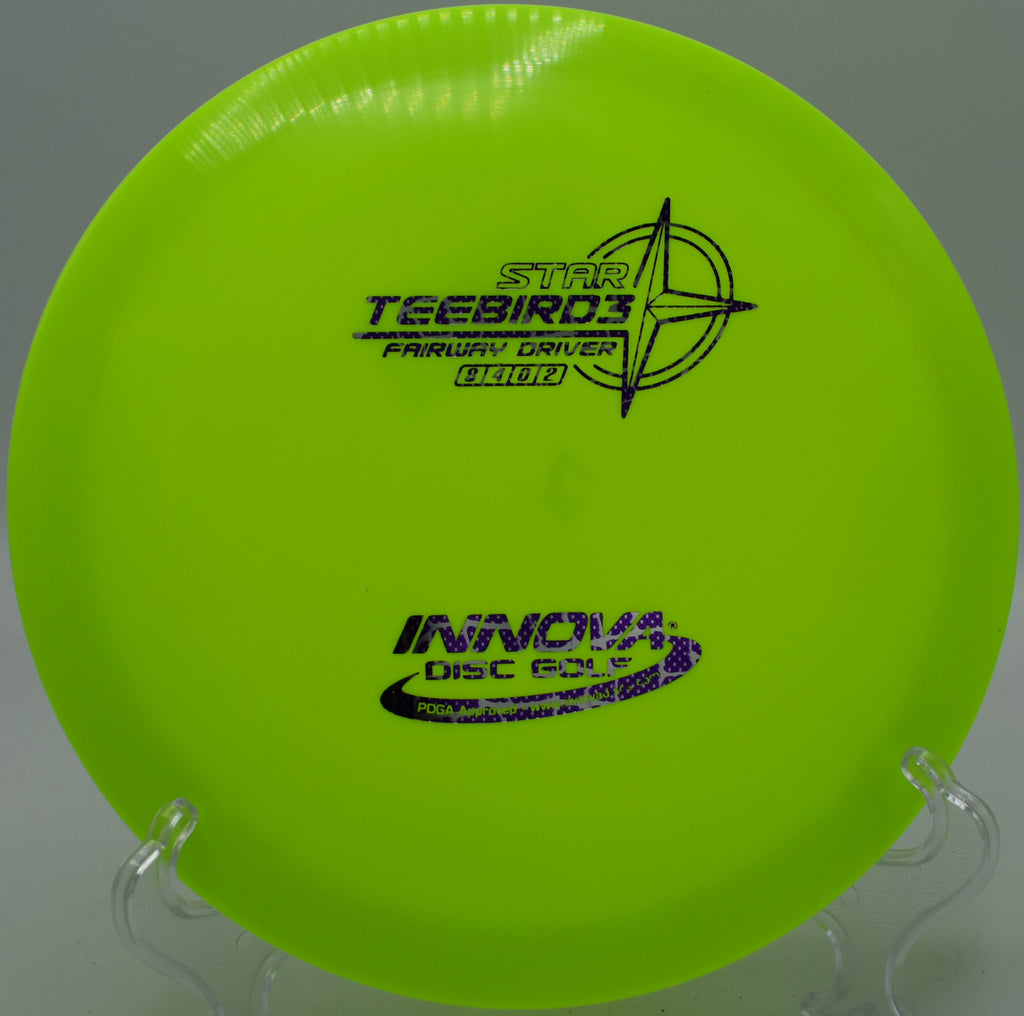 Star TeeBird3 ripping a dead-straight laser line through tight woods at Idlewild Disc Golf Course in Kentucky.


